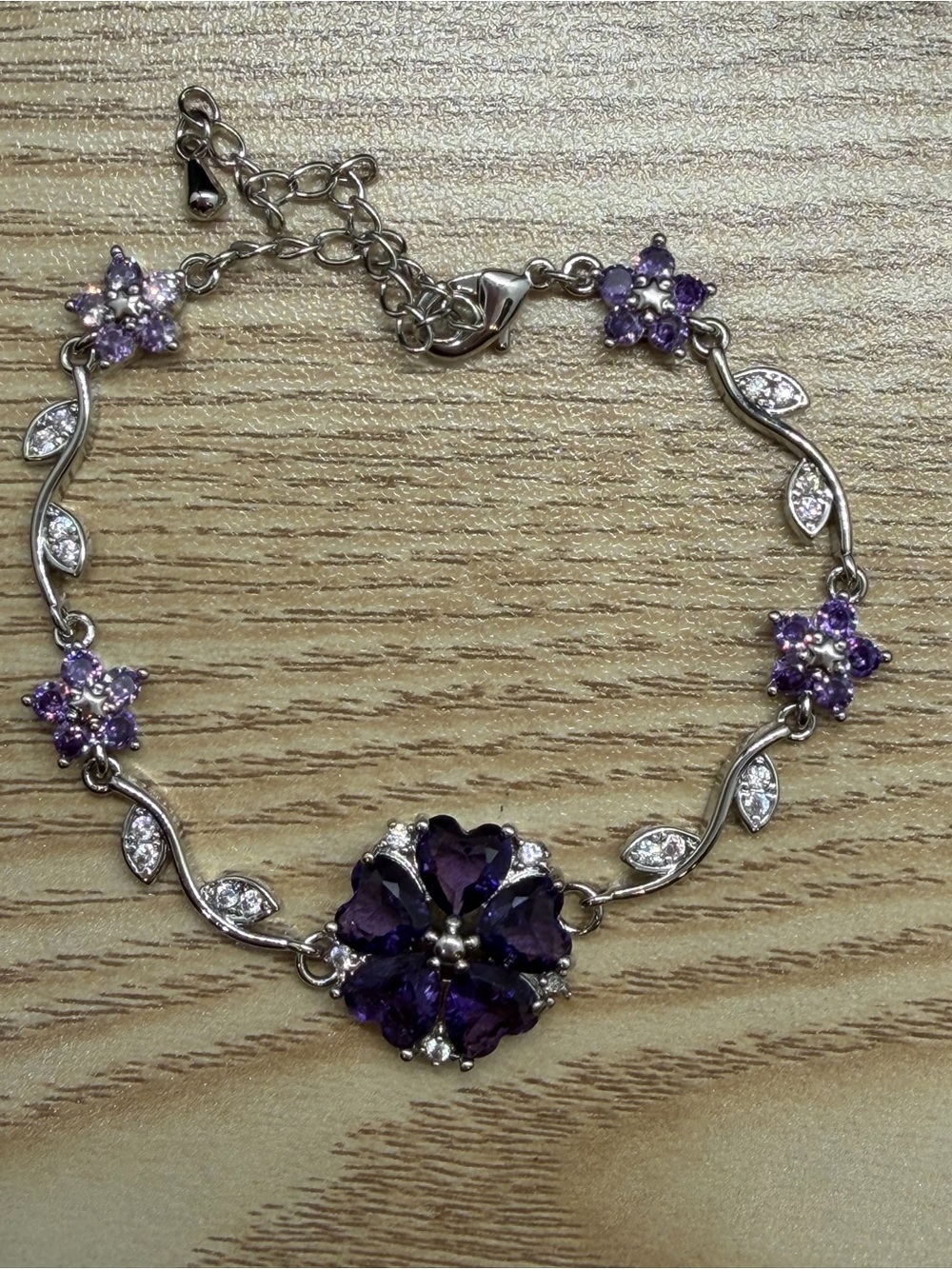 Silver Floral Bracelet with Purple Gemstones